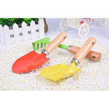 Hot sale colorful safe kid mini toys garden beach sand scoop kids trowel shovel tool set with wooden handle